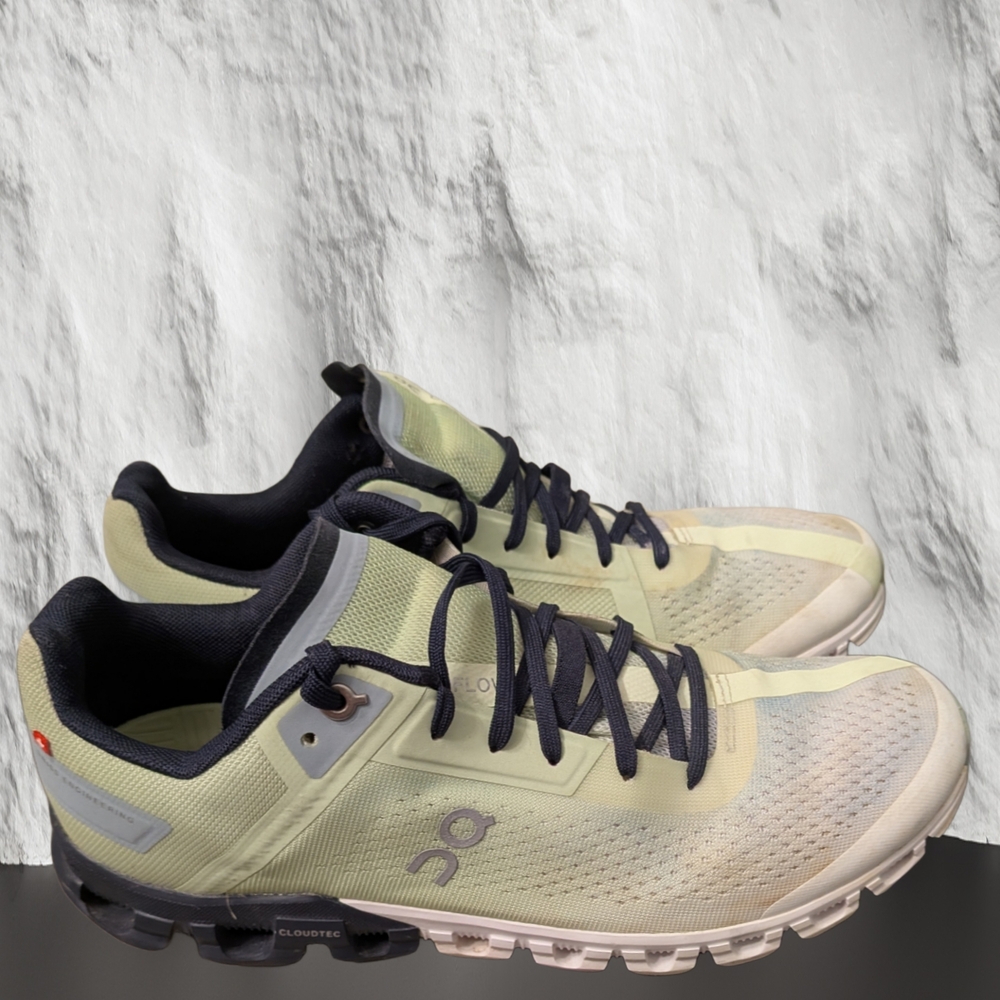 On Running Black and Cream Athletic Shoes for Trail Adventures